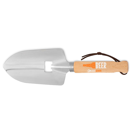 A bottle opener in the shape of a trowel, made from stainless steel and wood - Heston
