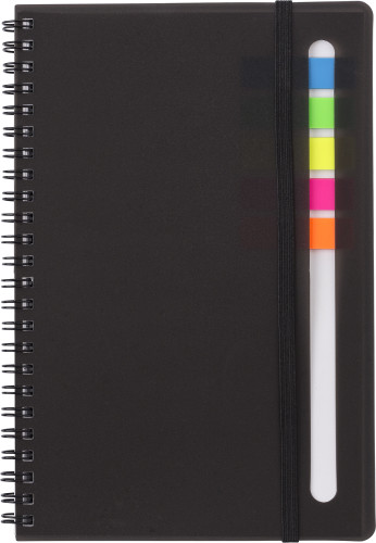 A notebook with a binding of wire that includes multicolored sticky notes - Aston Cantlow