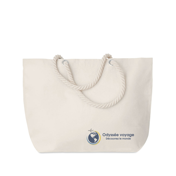 A cotton bag with a cord handle that can be used for the beach or for shopping - Saltwood